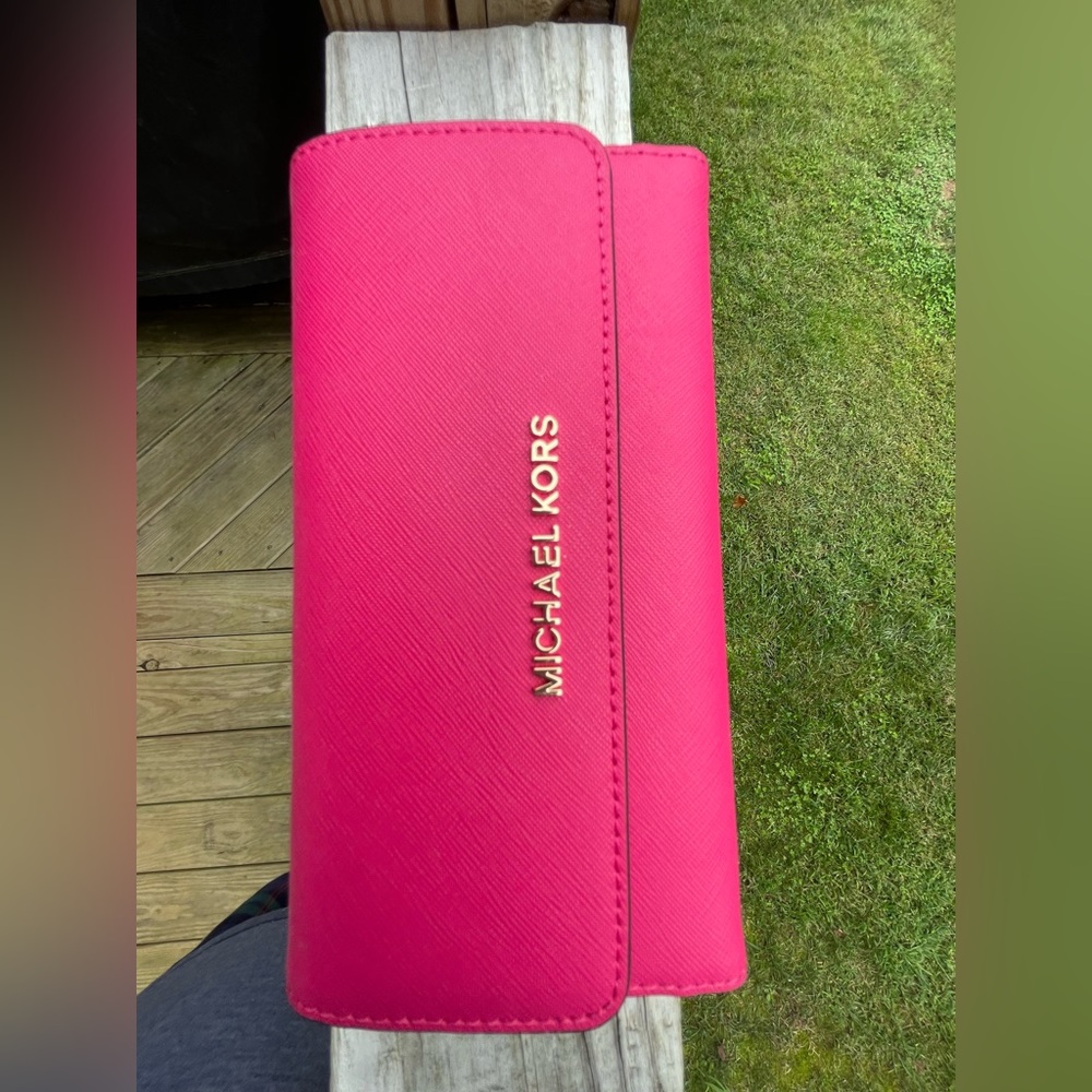 Dark pink Michael Kors full size wallet. Like new never used